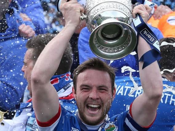 Linfield's Jamie Mulgrew lifts the Gibson Cup