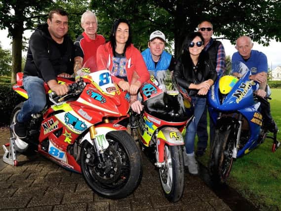 Steven Lynd (fourth from left) pictured with his team before the Ulster Grand Prix. Included are (from left): Neil Henderson, Ivor Lynd, Fiona O'Sullivan, Steven Lynd, Jade Lynd, Geoff Lynd and Sammy Crossett.