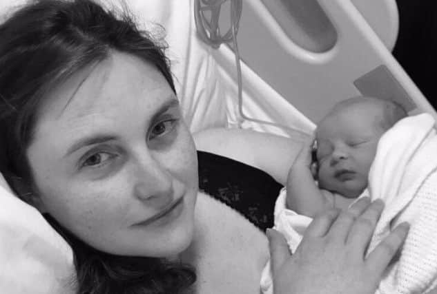 Alex Kane's partner, Kerri Kane-Dune, with their new born baby boy Independence.