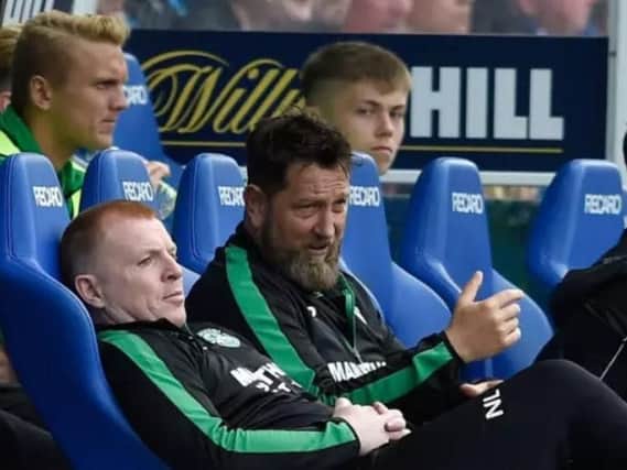 Hibernian manager Neil Lennon (left) in the dugout during the Ladbrokes Scottish Premiership match at the Ibrox Stadium, Glasgow
