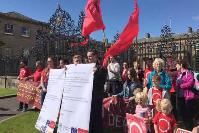 An Irish language protest takes place at gates of Hillsborough Castle in Belfast, as they called on the UK government to ensure the introduction of legislative protections for gaelic speakers amid an ongoing Stormont stalemate on the issue