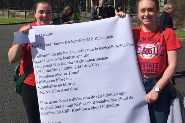 An Irish language protest takes place at gates of Hillsborough Castle in Belfast, as they called on the UK government to ensure the introduction of legislative protections for gaelic speakers amid an ongoing Stormont stalemate on the issue