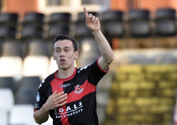 Crusaders' Paul Heatley celebrates finding the net against Warrenpoint Town. Pic by PressEye Ltd.
