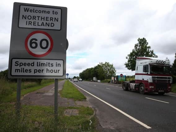 File photo dated 15/06/16 of traffic crossing the border between the Republic of Ireland and Northern Ireland in the village of Bridgend, Co Donegal.