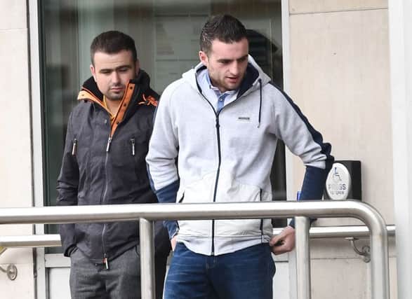 Charles Ward (grey Coat) and Shane Ward (dark Coat) at Newtownards Court on Thursday.

Two Coalisland cousins were in court today (thurs) accused of defrauding an elderly woman. 


Standing side by side in the dock of Newtownards Magistrates Court, Charles Ward and Shane Ward spoke only to confirm they understood the various charges against them. 


With all the offences alleged to have been committed on 4 July this year Charles Ward (23), from Gortview Park and 22-year-old Shane Ward, from Dixon Court, are jointly charged with fraud by falsely representing to a female pensioner they had undertaken work at her home, failing to give notice of the right to cancel a contract and possessing class B cannabis. 


Charles Ward is further charged with engaging in misleading commercial practice and engaging in aggressive commercial practice in that he allegedly "demanded cash with menace so as to significantly impair...the average consumer's freedom of choice or conduct i
