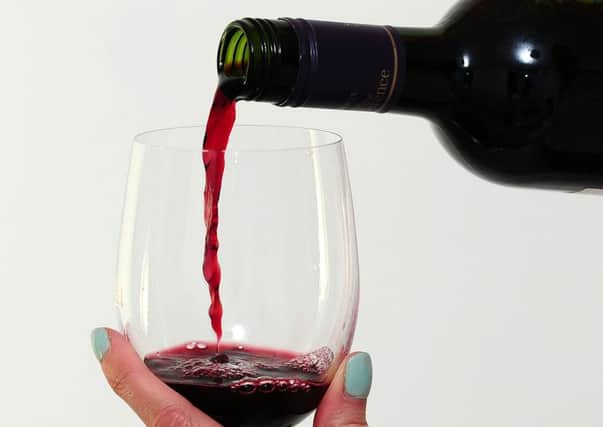 Undated file photo of a glass of red wine being poured