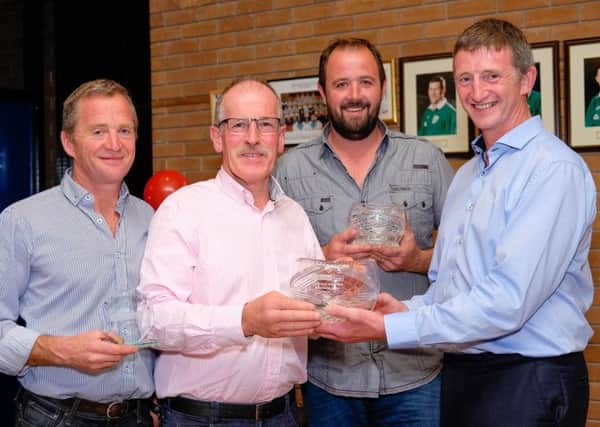 Sponsor Robert McCullough, right, Danske Bank, congratulates large herd prize winners, from left: Brian Johnston, representing third prize winner Rory Best; Robin Lamb, first; and Stephen Wallace, second. Picture: Coluimba O'Hare.