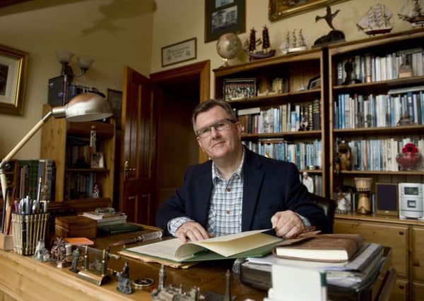 Jeffrey Donaldson at home relaxing in his study