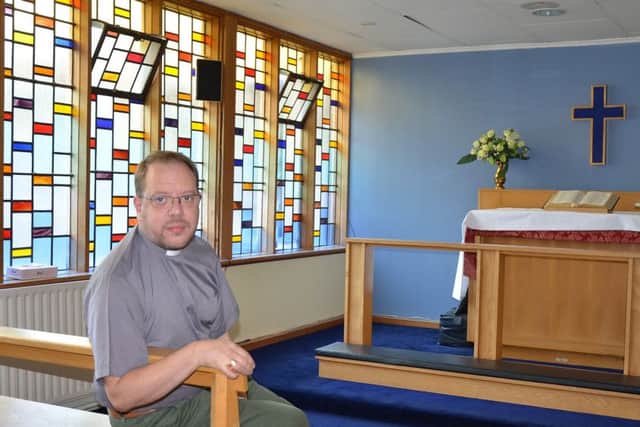 Rev Adam Pullen in the Church of Ireland church in St. Josephs Hospital, Stranorlar which he believes is threatened with closure.  Pic: Anne McMenamin, Finn Valley Voice newspaper.