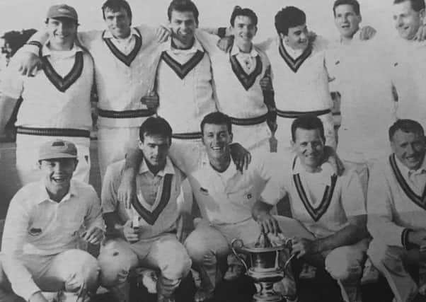Waringstown celebrate the 1992 Irish Cup final triumph. Back, from left, man of the match Brian Sturgeon, Alan Nelson, Alvin Spence, Neil Carson, Giles Sandford, Shane Harrison and Alan Waite, Front, wicketkeeper Simon O'Neill, Noel Nelson, Paul McCrum, Garfield Harrison and Barry Harrison