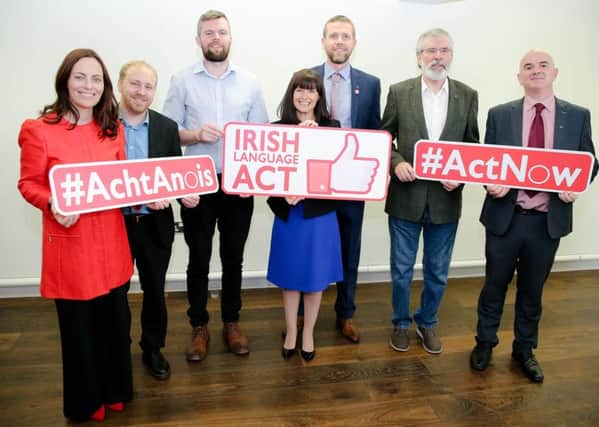 The Green Party and Alliance Party engage in naive politics for a photo opportunity with Gerry Adams. Paula Bradshaw MLA (Alliance), centre, and Steven Agnew MLA (Green Party), second from left, with others including Nicola Mallon MLA (SDLP), left, Gerry Carroll MLA (People Before Profit), third from left, and Gerry Adams TD (Sinn Fein), second from right, at the MAC theatre in Belfast, all demanding a standalone Irish language act.

Picture: Philip Magowan/PressEye