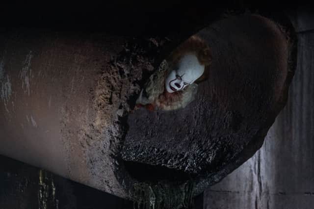 Undated film still handout from the 2017 adaptation of It. Pictured: Bill Skarsgard Pennywise in It. See PA Feature FILM King. Picture credit should read: PA Photo/Warner Bros. Entertainment Inc./Rat-Pac Dune Entertainment LLC/Brooke Palmer. WARNING: This picture must only be used to accompany PA Feature FILM King.