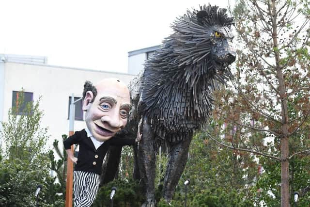 One of the entertainers beside CS Lewis Square imposing Aslan statue during the official opening of the Connswater Community Greenway in East Belfast.
Photo Colm Lenaghan/Pacemaker Press