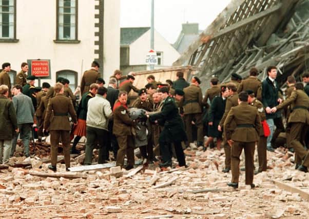 The Sinn Fein chair of Fermamagh and Omagh Council who recently refused to condemn the Enniskillen Poppy Day massacre (pictured) has come under fire for blocking a UUP call for investigations into all Troubles murders. Council Chairman Stephen McCann instead pushed through his own party's motion focusing on murders by loyalists only. Pic: Pacemaker.