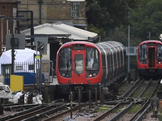 A forensic tent on the platform at Parsons Green station in west London after Scotland Yard declared a terrorist incident following a blast which sent a "fireball" and a "wall of flame" through a packed London Underground train.