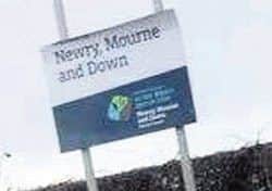 An NMDDC boundary sign which had the top half - which was in Irish - cut off with an angle grinder