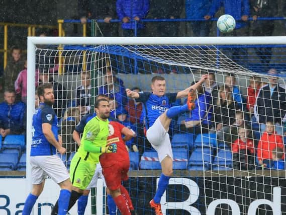 Action from Glenavon versus Cliftonville