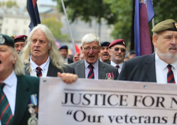 Former British soldier Dennis Hutchings (centre), who has been charged over the fatal 1974 shooting of a man in Northern Ireland, takes part in a protest to call for an end to prosecutions of veterans who served during the Troubles, on Horse Guards Parade, London. PRESS ASSOCIATION Photo. Picture date: Saturday September 16, 2017. See PA story PROTEST Soldier. Photo credit should read: Gareth Fuller/PA Wire