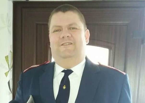 Marquez Glenny pictured in the uniform of Derryogue Flute Band