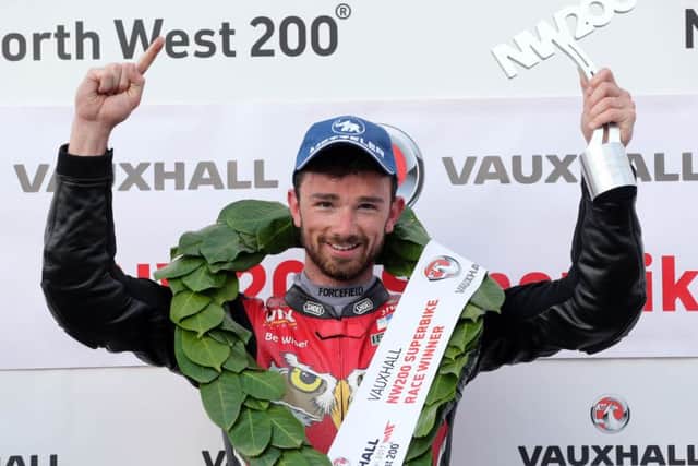 Carrick rider Glenn Irwin celebrates his victory in the feature Superbike race at the North West 200 in May.