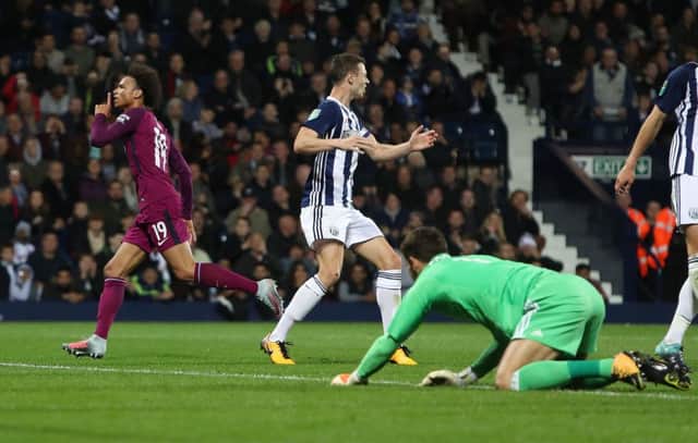Manchester City's Leroy Sane celebrates scoring his side's second goal of the game during the Carabao Cup, Third Round match at The Hawthorns, West Bromwich Albion. PRESS ASSOCIATION Photo. Picture date: Wednesday September 20, 2017. See PA story SOCCER West Brom. Photo credit should read: David Davies/PA Wire. RESTRICTIONS: EDITORIAL USE ONLY No use with unauthorised audio, video, data, fixture lists, club/league logos or "live" services. Online in-match use limited to 75 images, no video emulation. No use in betting, games or single club/league/player publications.