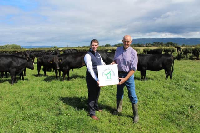 LMCs Farm Quality Assurance Manager Daryl McLaughlin with Hugh McCollum, chairman of the Aberdeen Angus Quality Beef Ltd.