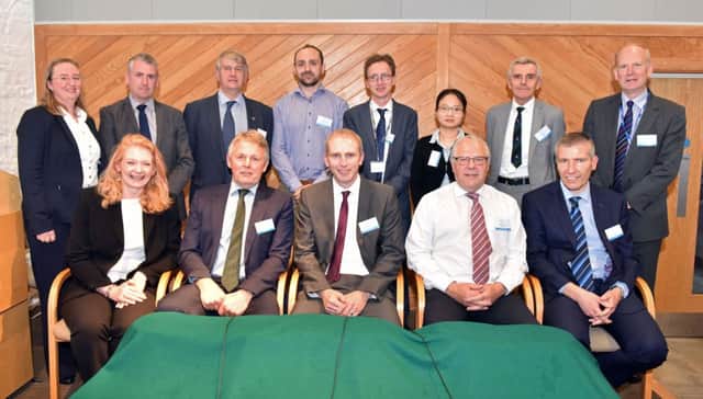 The panel of industry representatives who took part in the discussion at the seminar pictured with (back row, far right) Dr Sinclair Mayne (AFBI CEO) and (back row, far left) Dr Elizabeth Magowan (AFBI DCEO) and the report authors, back row, from 2nd right AFBIs Professor John Davis, Dr Siyi Feng and Dr Myles Patton