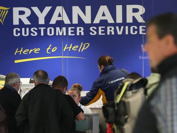 The Ryanair customer service desk at Dublin Airport, as the crisis over pilot shortages and warnings that crews are rejecting cash bonuses to commit to the airline will be addressed
