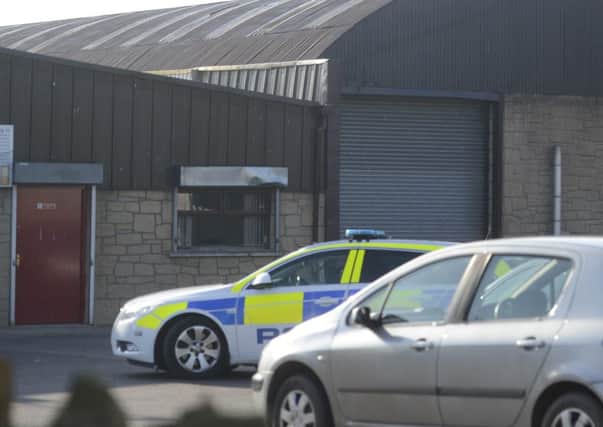 Police at the scene of the discovery of the body in the Moor Road area of Coalisland.