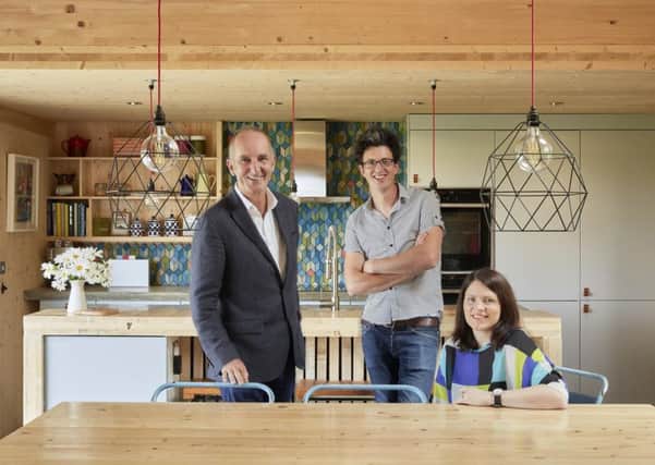 Grand Designs presenter Kevin McCloud (left) was very impressed with the family home designed by architect Micah Jones, pictured here with wife, Elaine.