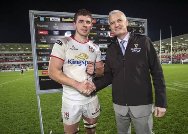 Manus Rogan representing Guinness presents the Guinness Man Of The Match Award to Nick Timoney
