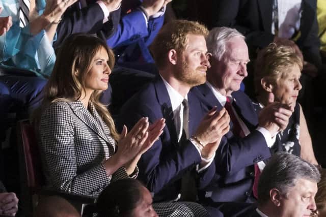 Melania Trump and Prince Harry attend the opening ceremony