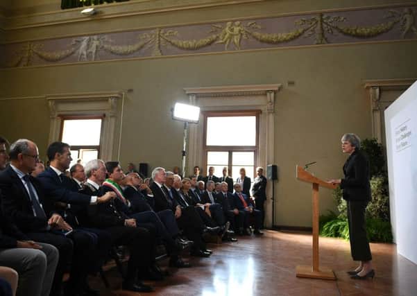 Prime Minister Theresa May in Florence, Italy, sets out her plans for a transitional period from the date of Brexit in March 2019, expected to last two years, before moving to a permanent trade deal. It was good to hear Mrs May refer to the joint commitment to an absence of border physical infrastructure. Photo: Jeff J Mitchell/PA Wire