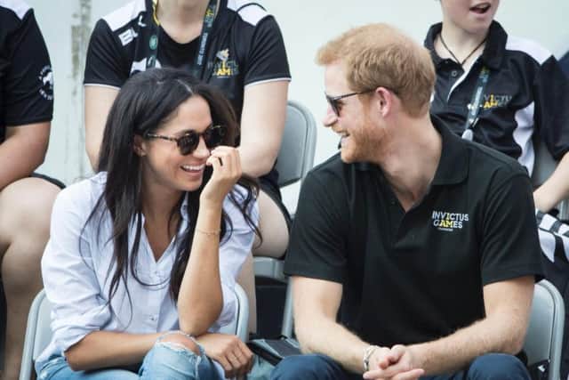Prince Harry and Meghan Markle watch Wheelchair Tennis at the 2017 Invictus Games in Toronto, Canada