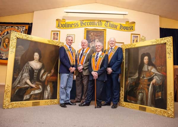 Orangemen pictured with the Williamite portraits are (from left) Stuart Brooker, Co Fermanagh grand master; Sam Carrothers; Barrett Rennick and Alan Elliott, Co Fermanagh grand secretary