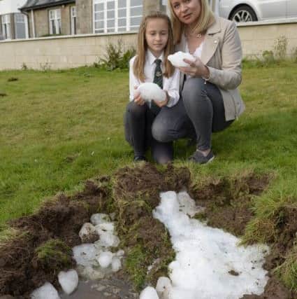 The rock struck the garden of the Helliwell family with a "big boom" and shook their home