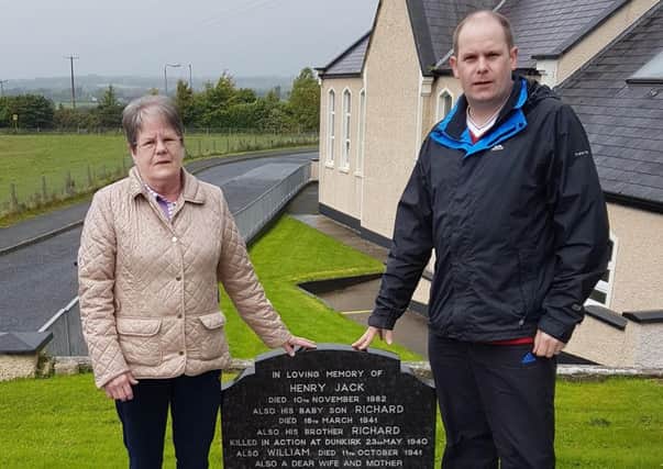 Scott Clark and his mother Mavis at the family grave where Alan Jack was buried