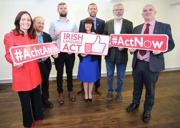 Alliance MLA Paula Bradshaw, centre, with other politicians including Gerry Adams TD at an event in August to demand a standalone Irish language act.

Picture: Philip Magowan / PressEye