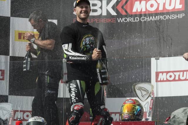 The victory champagne tasted sweet for history-maker Jonathan Rea.