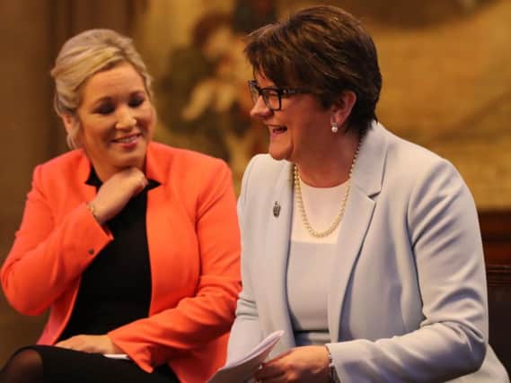 DUP leader Arlene Foster and Sinn Fein's Northern Ireland leader Michelle O'Neill attend the Ulster fry breakfast at Manchester Town Hall during the Conservative Party Conference at the Manchester Central Convention Complex in Manchester