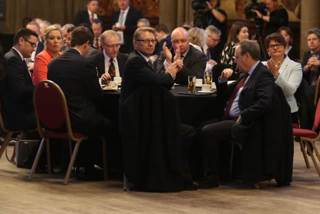 DUP leader Arlene Foster and Sinn Fein's Northern Ireland leader Michelle O'Neill with Northern Ireland Secretary James Brokenshire and others including Nigel Dodds MP attend the Ulster fry breakfast at Manchester Town Hall during the Conservative Party Conference at the Manchester Central Convention Complex in Manchester on Tuesday. Photo: Owen Humphreys/PA Wire