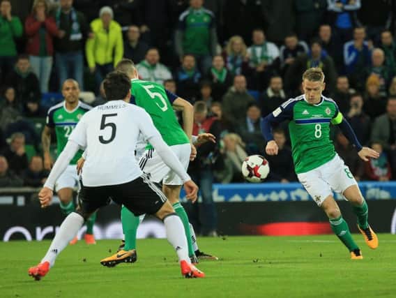 Northern Ireland's Steven Davis and Germany's Mats Hummels