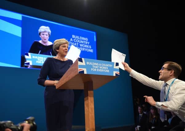Theresa May is confronted by a prankster who calls himself Lee Nelson during her keynote speech at the Conservative Party conference. The prank, in which Nelson handed Mrs May her P45 at the behest of Boris Johnson, was in a way more of an insult to Mr Johnson because it suggested he is disloyal and scheming