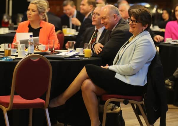 Sinn Fein's Northern Ireland leader Michelle O'Neill and, right, DUP leader Arlene Foster and at the Ulster fry breakfast at Manchester Town Hall during the Conservative Party Conference on Tuesday October 3, 2017. Photo: Owen Humphreys/PA Wire