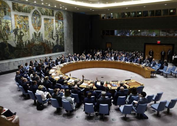 As world spirals into chaos, the United Nations chooses to condemn the only democracy in the Middle East, Israel. (AP Photo/Jason DeCrow)