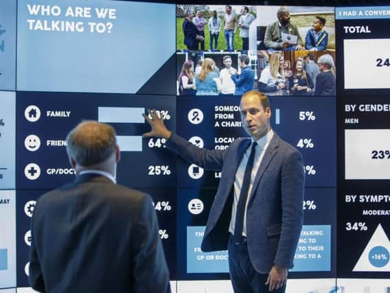 The Duke of Cambridge (right) during a visit to Imperial College London's Data Observatory.  The Duke has praised the "fantastic" work of the royal Heads Together campaign, as his charitable foundation announced a 2 million investment towards a new mental health start-up company. During the visit, William learned about the campaign's progress in its drive to "change the conversation on mental health".
