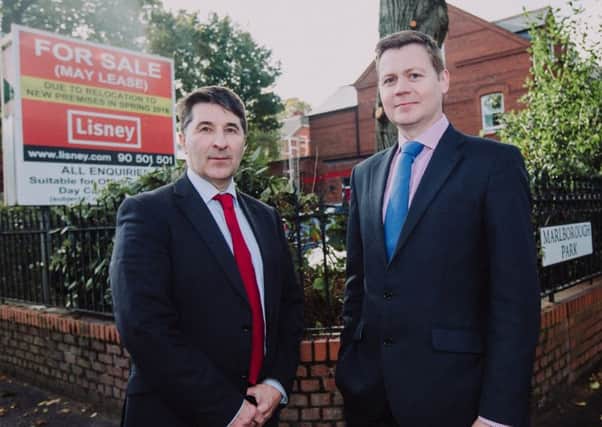 Andrew Gawley, associate director Lisney (right), and Action Cancer chief executive Gareth Kirk at the south Belfast property