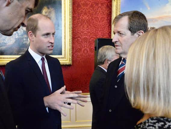 The Duke of Cambridge speaks to Alastair Campbell at a reception on World Mental Health Day at St James's Palace, London, to celebrate the impact of the Heads Together Charity.