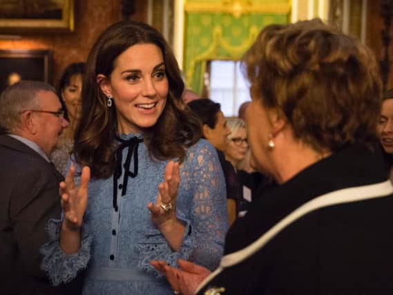 The Duchess of Cambridge attends a reception on World Mental Health Day at Buckingham Palace, London, to celebrate the contribution of those working in the mental health sector across the UK