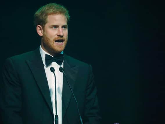 Prince Harry speaks after receiving a posthumous Legacy award on behalf of his mother Diana, Princess of Wales, at the Attitude Awards in London.. Prince Harry has called on all people to "embrace regular testing" for HIV and Aids as he paid tribute to his late mother's work in breaking down the stigma attached to the disease. The royal's comments came as he attended the Attitude magazine awards on Thursday night, where Princess Diana was posthumously honoured with the Legacy award 20 years after her death. Photo: Frank Augstein/PA Wire